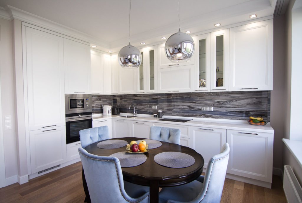 Kitchen with a built-in refrigerator