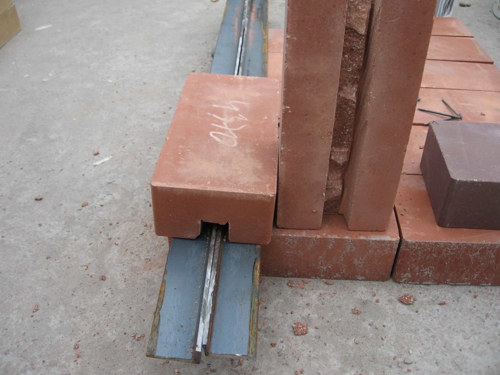 Brick lintel and metal bracket