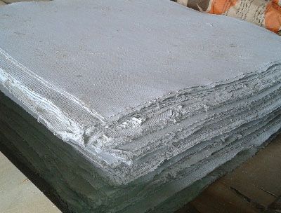 Asbestos sheet for a bath